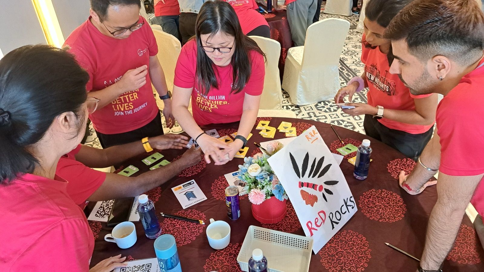 A team working on a hands-on building challenge